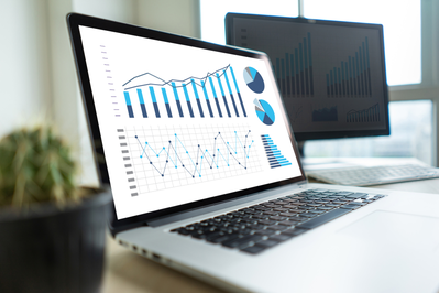 analytic charts displayed on laptop