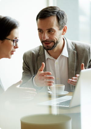 man talking to other employee