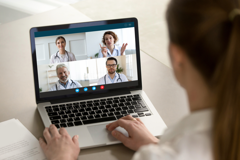 patient watching webinar hosted by pharmacists